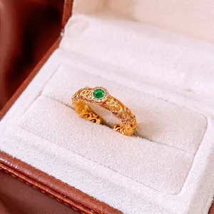 Vintage 24k gold plated open ring with green stone and floral engraving in a box