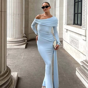 Detail of light blue off-shoulder bodycon dress with elegant draping and sash detail