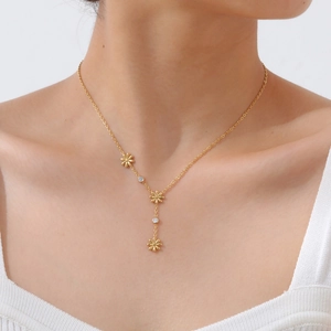 Elegant gold-tone Y-shaped stainless steel necklace with daisy floral charms and zircons