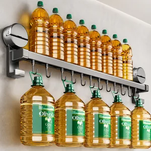 Strong suction kitchen wall rack with 10 J-hooks holding heavy oil bottles in grey metal