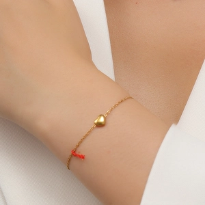 Collier élégant en titane doré avec pendentif cœur et chaîne minimaliste