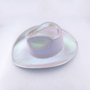 Detail of holographic cowboy hat with iridescent purple and green pearlescent fabric