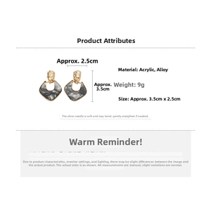 Detailed specs of acrylic marble drop earrings with dimensions, 9g weight, and silver posts