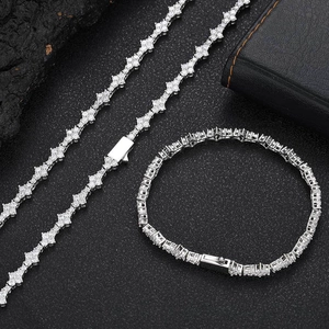 Detail of silver tennis chain necklace and bracelet set with sparkling cubic zirconia