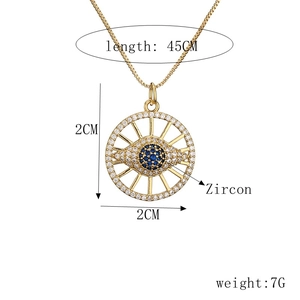 Detail shot of a 2CM gold zircon evil eye pendant with 45CM chain dimensions and 7G weight