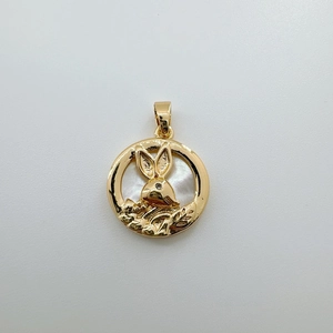 Detail of 18K gold plated pendant with rabbit carving on natural mother of pearl inlay