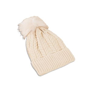 Detailed cable knit pattern and large fluffy pom-pom on cream knitted winter beanie hat