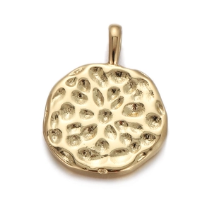 Macro view of gold round charm pendant with irregular textured finish and top connector
