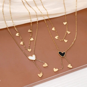 Elegant gold heart pendant necklace for women in black and white Y-shaped layered design