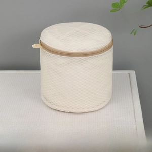 Detail of 15X17CM beige honeycomb mesh bra laundry bag with zipper and handle strap