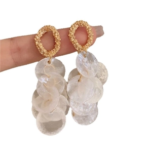 Silver needle round shell tassel earrings with golden metal tops for women