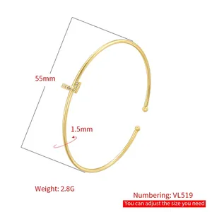Minimalist gold-plated bangle with V-shaped pavé zircon inlay and adjustable open design