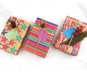 Detail of Happy Birthday kraft wrapping paper with stars and stripes on gift boxes