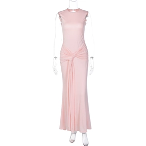 Detail of pink sleeveless maxi dress with waist knotting and pleated ruching textures