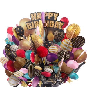Detailed view of 3D pop-up birthday card with colorful balloons and gold glitter lettering