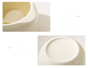Detail of cream ceramic lard jar with integrated handles and non-slip bottom base