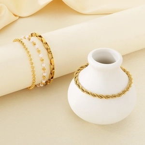 Elegant 18k gold plated stainless steel bracelet set with pearls and textured twisted chains