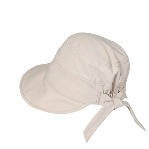 Women's UV protection sun hat in beige cotton with wide brim and bow ribbon detail