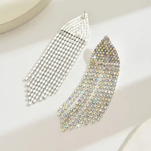 Macro detail of cascading waterfall tassel earrings with shimmering AB rhinestones