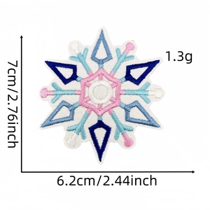 Macro detail of snowflake embroidery patch showing 7cm x 6.2cm size and 1.3g weight