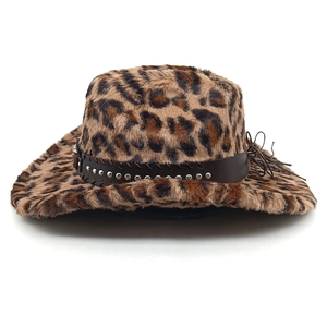 Detail of leopard print faux fur texture and leather band with silver studs on cowboy hat