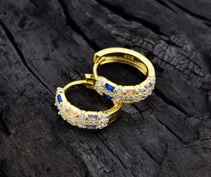 Detailed macro view of S925 sterling silver hoop earrings with colorful zircon stones
