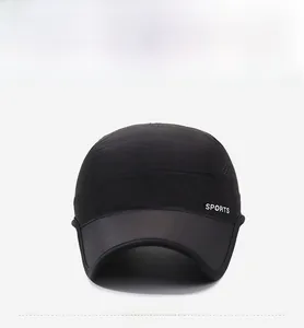 Close-up of black quick-dry baseball cap with white Sports embroidery on the brim