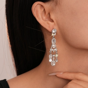 Elegant geometric teardrop tassel earrings with sparkling crystals for formal events