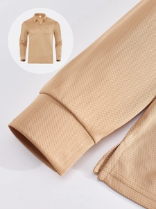 Close-up of khaki polo shirt mesh fabric texture and ribbed cuffs detail for men