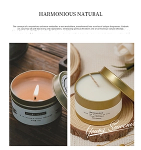 Detail of soy wax candle in golden tin with sea salt and mimosa scent and burning flame