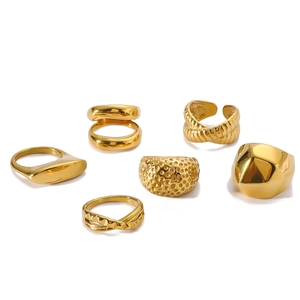 Set of six chunky 18K gold plated stainless steel rings in varied hip-hop styles