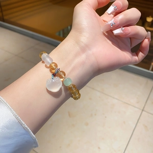 Elegant white chalcedony and yellow crystal beaded bracelet with a cute cat charm pendant