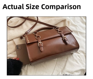 Brown vintage messenger bag side by side with a smartphone for size comparison