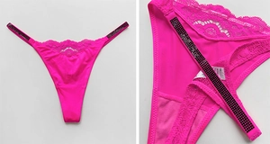 Detailed macro view of rose red lace thong featuring elegant black rhinestone side straps