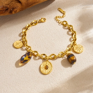 Vintage gold chunky chain bracelet with oval tiger eye stone and star pendant