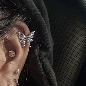 Elegant zircon butterfly ear cuff earring set worn on model side view for women