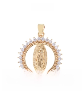 Detailed close-up of golden Virgin Mary pendant with sparkling circular zircon inlay
