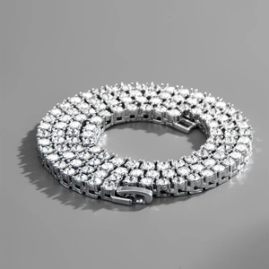 Hip hop tennis necklace with XO letter pendant in silver finish and cubic zirconia stones