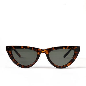 Classic tortoiseshell cat-eye sunglasses with dark grey lenses on white background