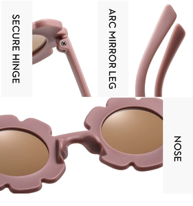 Detailed macro view of pink sunflower sunglasses showing secure hinge and arc mirror legs