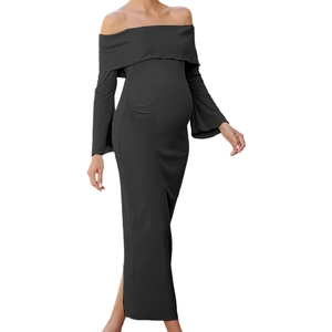 Detail of off-the-shoulder neckline with ruffles on a black maternity knit dress