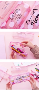 Detail of pink transparent cat pencil case with glitter texture and cute paw print
