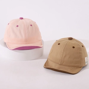 Cute baby soft brim baseball hats with Good Luck smiley patch in pink and khaki colors