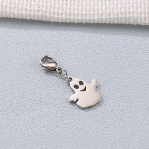 Polished stainless steel ghost pendant with lobster clasp on a grey textured background