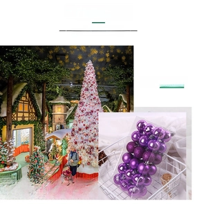 Detail of 4cm purple Christmas balls in mixed matte and glitter finishes in a clear box