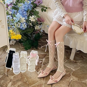 Detail of cream lace leg warmer socks with satin bows for Lolita and JK style outfits