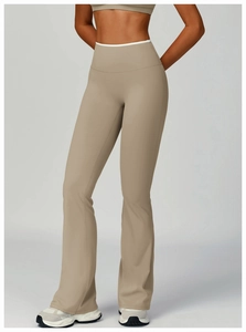 Close-up of khaki high-waisted flared yoga pants with tummy control and butt lifting