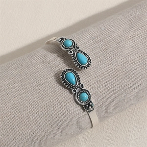 Vintage silver-tone cuff bracelet with turquoise stones in bohemian ethnic style