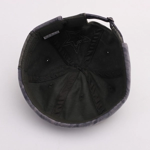 Detail view of Miki Hat interior with five-point star stitching and adjustable back strap