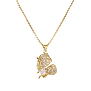 Elegant gold plated butterfly pendant necklace with cubic zirconia on white background